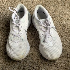 White Nike tennis shoes